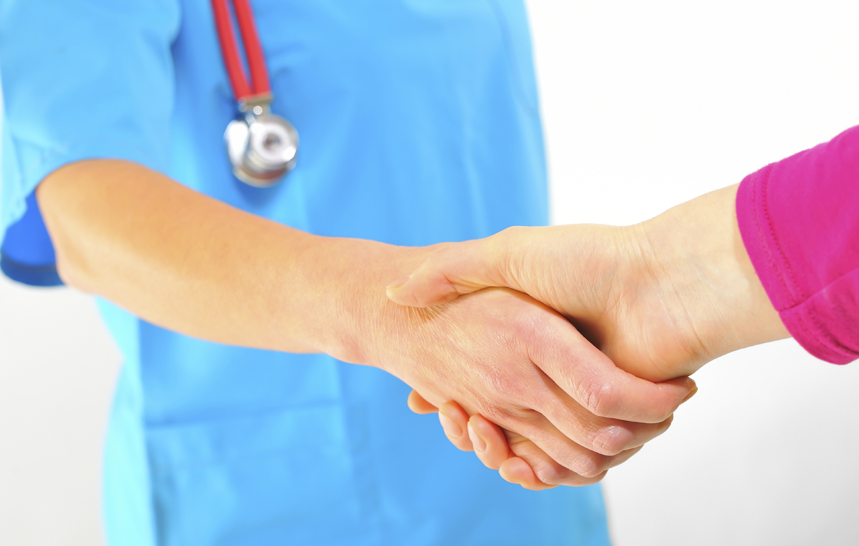 doctors shaking hands, close-up